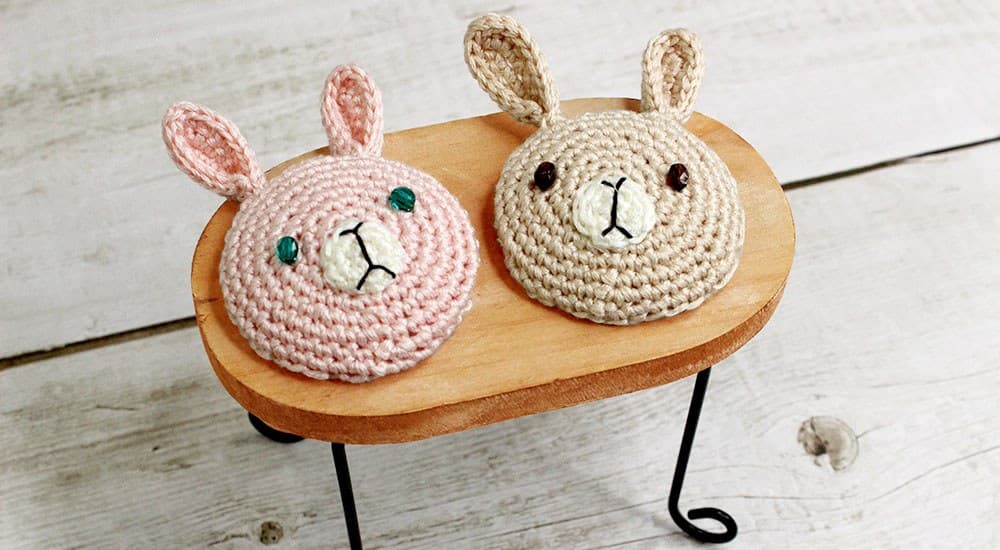 Twin rabbit crochet pouches in different colors