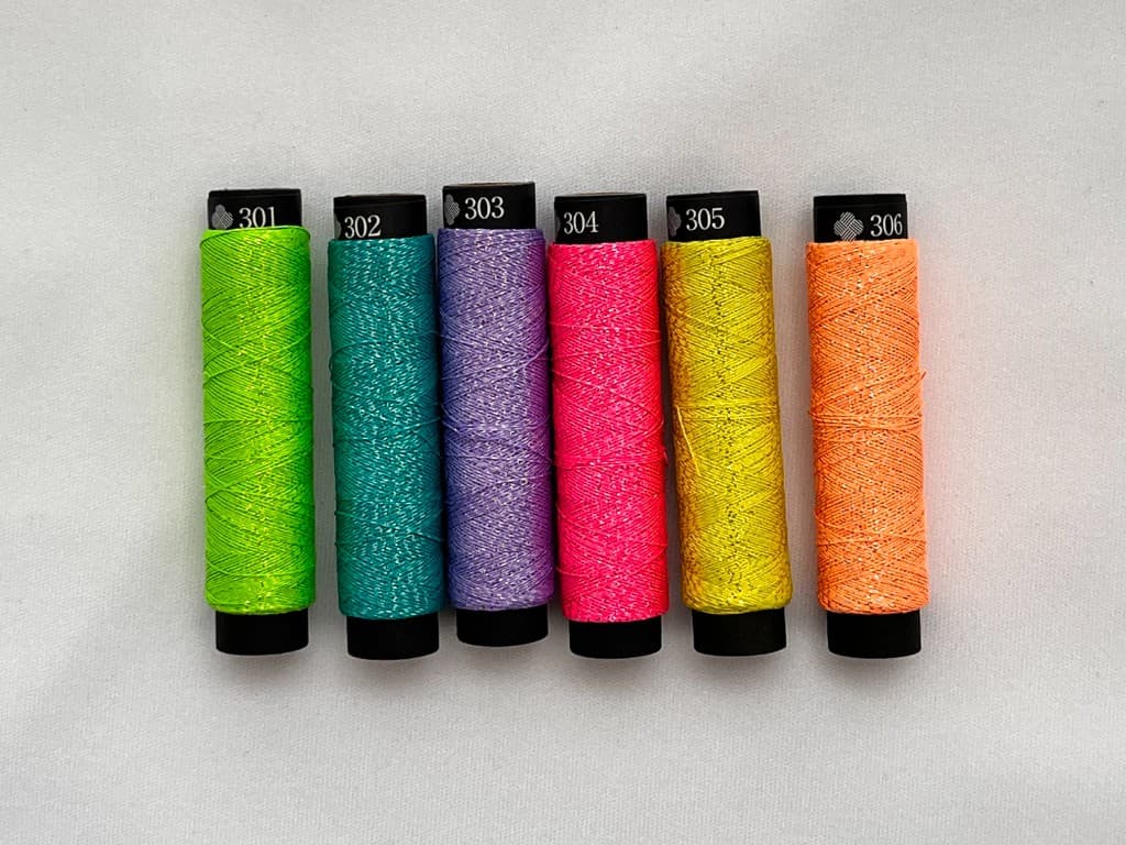 Neoni Tasuki Twisted metallic embroidery thread in vivid fluorescent shades
