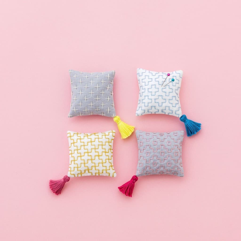 Sashiko pincushions with geometric patterns