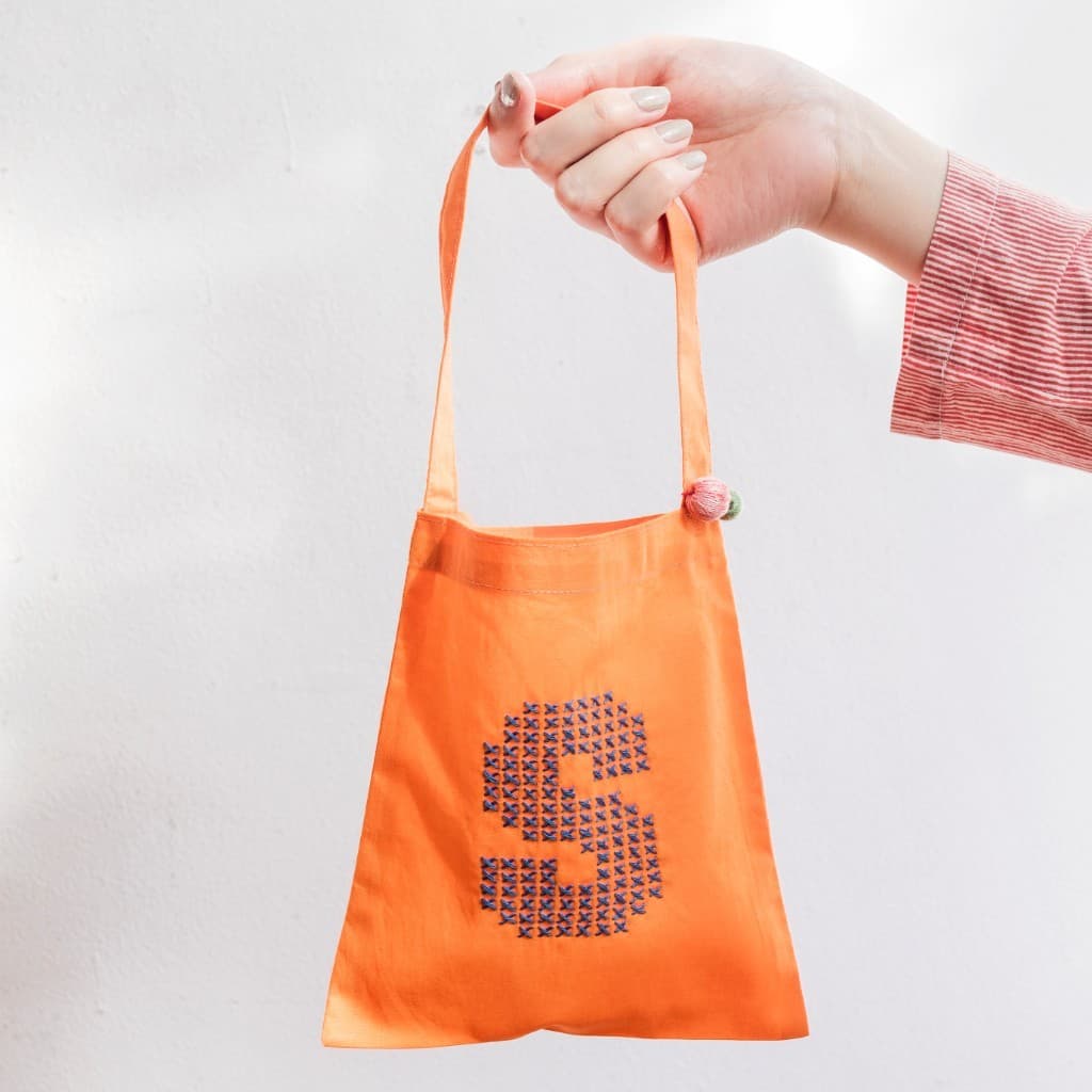 Mini tote with cross-stitch initial