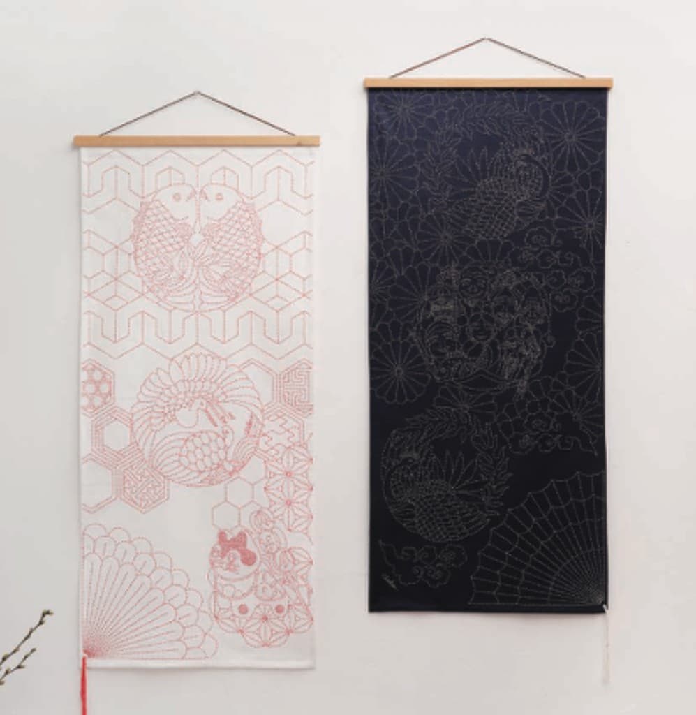 Celebratory sashiko fabric wall hangings with auspicious motifs