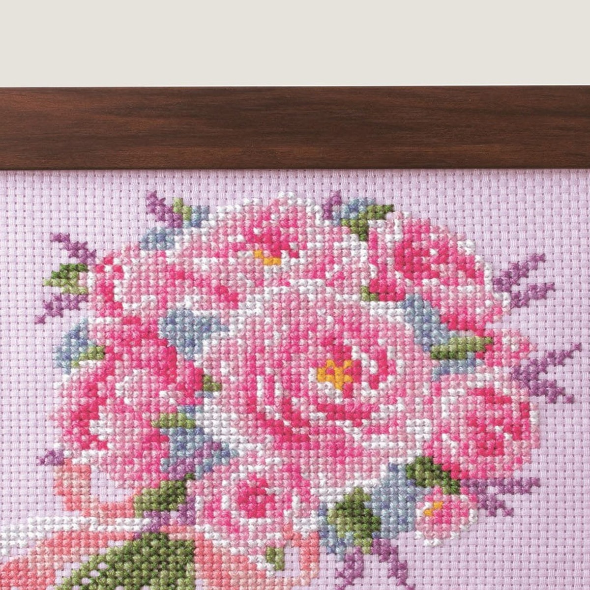 Close-up of the same rose bouquet showing shaded pink crosses