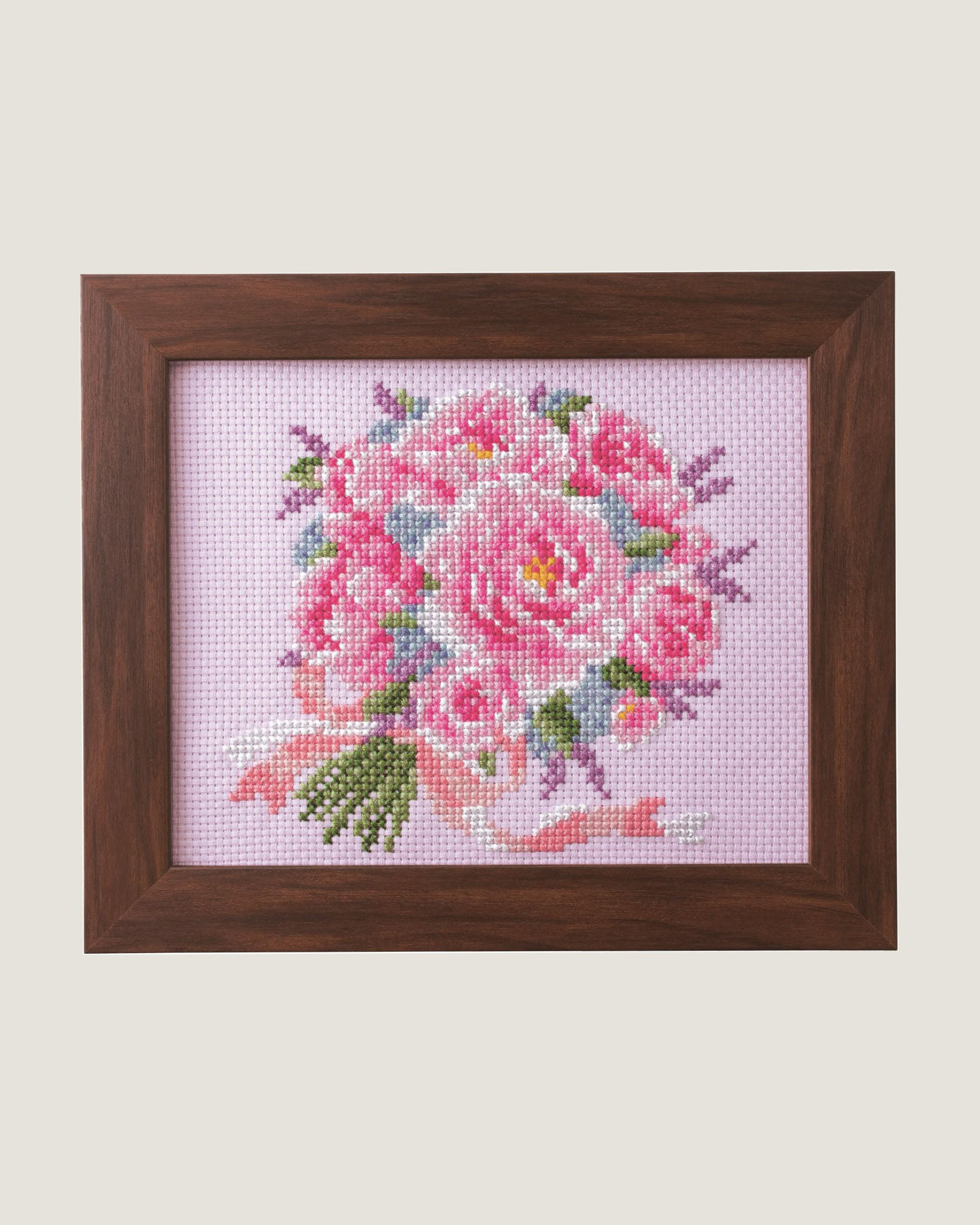 Framed pink rose bouquet pictorial cross-stitch on pale pink Aida