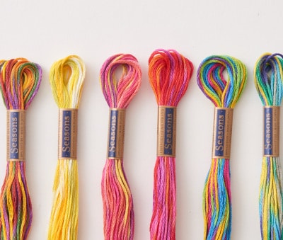 COSMO Seasons 9000 variegated embroidery floss skeins in vivid multi-color mixes
