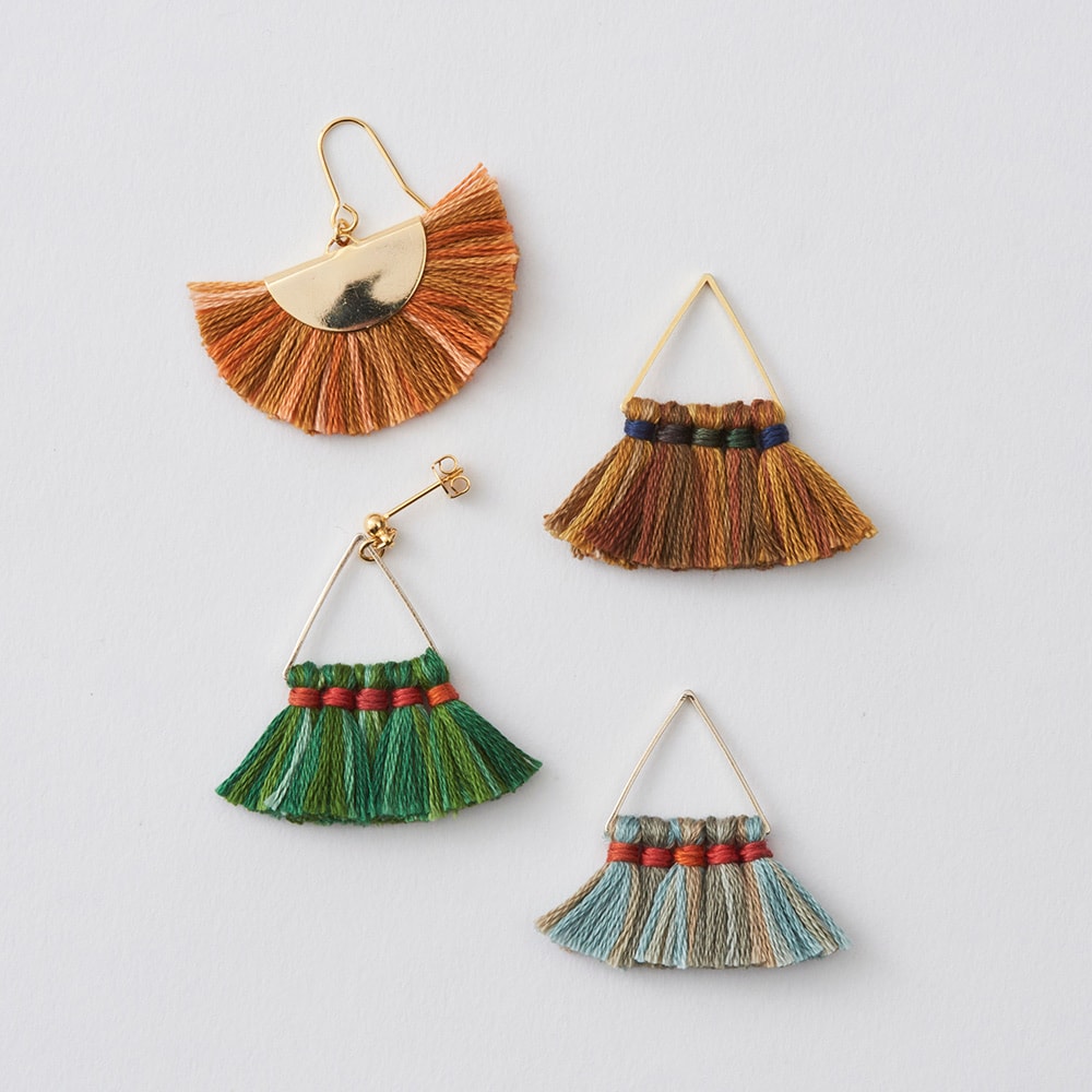 Handmade earrings with Seasons variegated floss tassels on gold wire frames