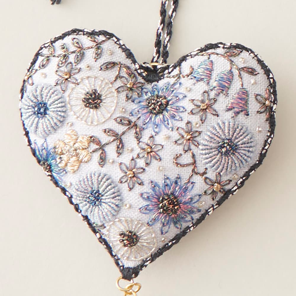 Heart-shaped ornament with bullion-stitch flowers embroidered using Iridescent metallic thread