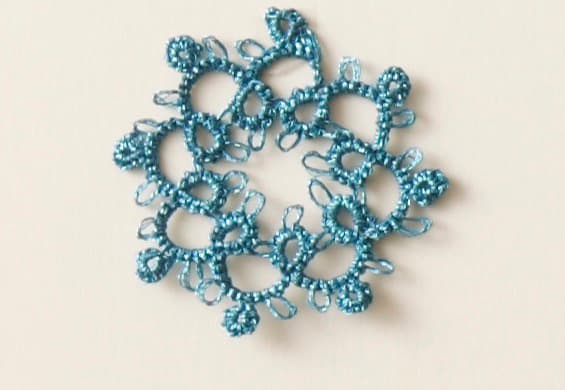 Tatting lace snowflake made with Nishiki metallic thread in color 06 Asagi
