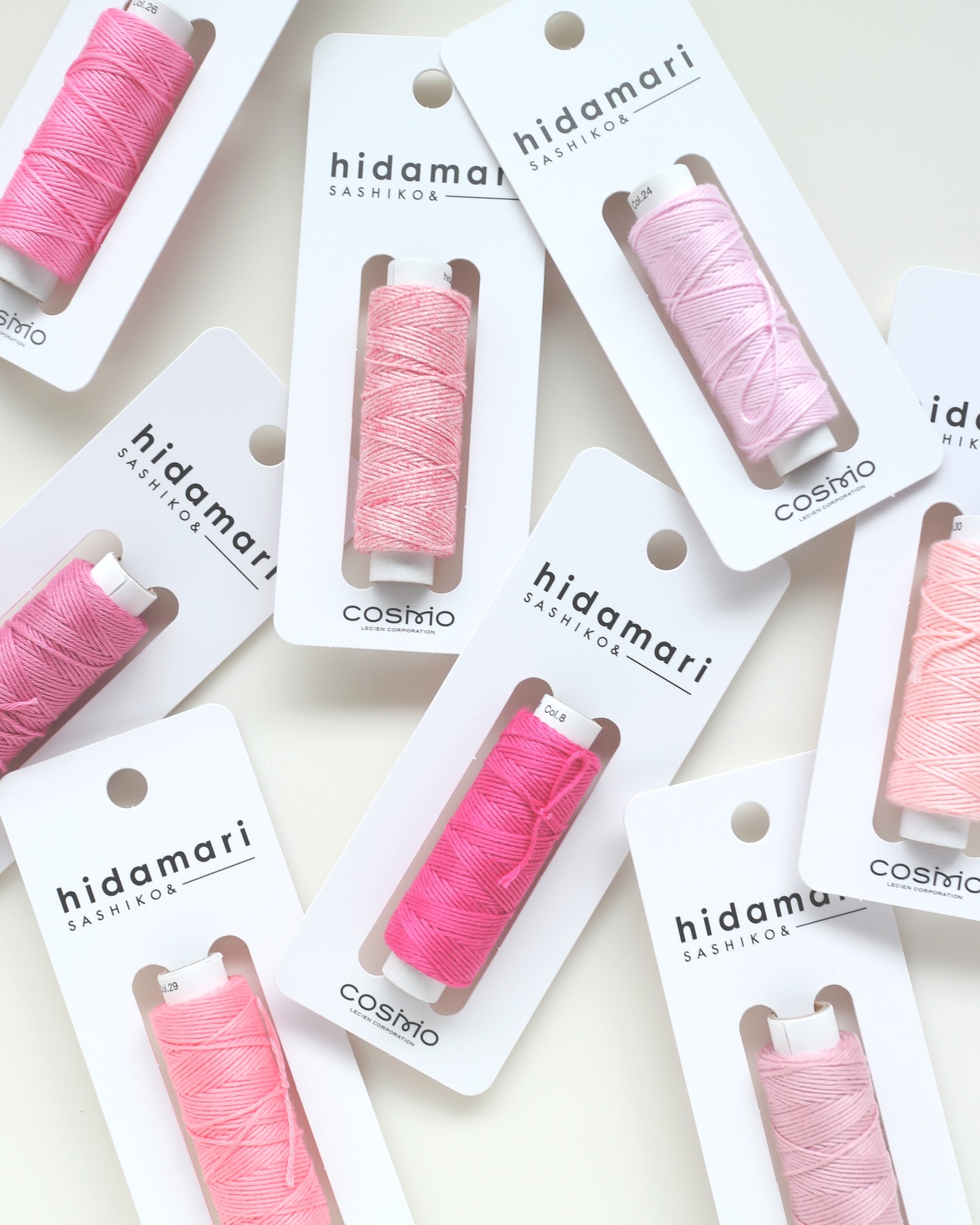 COSMO hidamari sashiko thread cards in pink shades on white retail packaging
